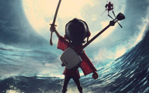 Kubo with his instrument facing the waves and full moon